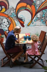Father and daughter in cafe, Hong Kong