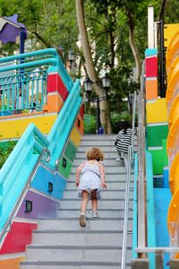 Walking up stairs at playground, Hong Kong