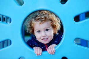 Toddler in the playground, Queenstown, New Zealand