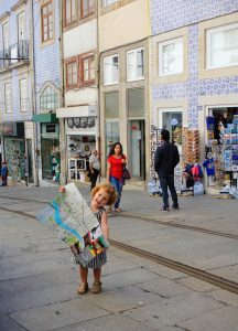 Toddler reading map in Porto, Portugal