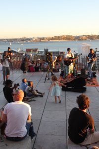 Little girl dancing to band in Lisbon, Portugal