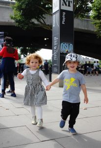 Two little friends holding hands, London Southbank